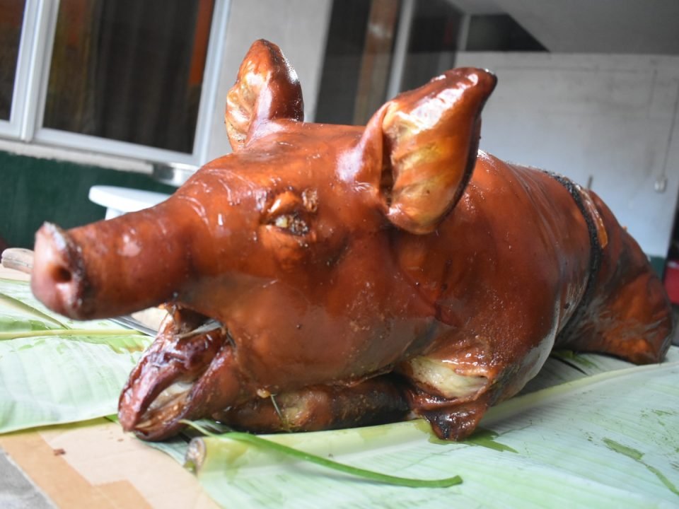 Lechon Baboy by Ganie’s Lechon – crispy roasted pork with golden skin and juicy meat, perfect for fiestas and Filipino celebrations.